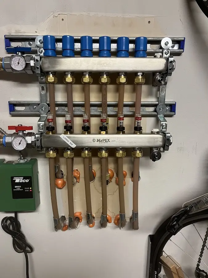 Plumber performing Water Heater Repair at a residential property in Chain Lake